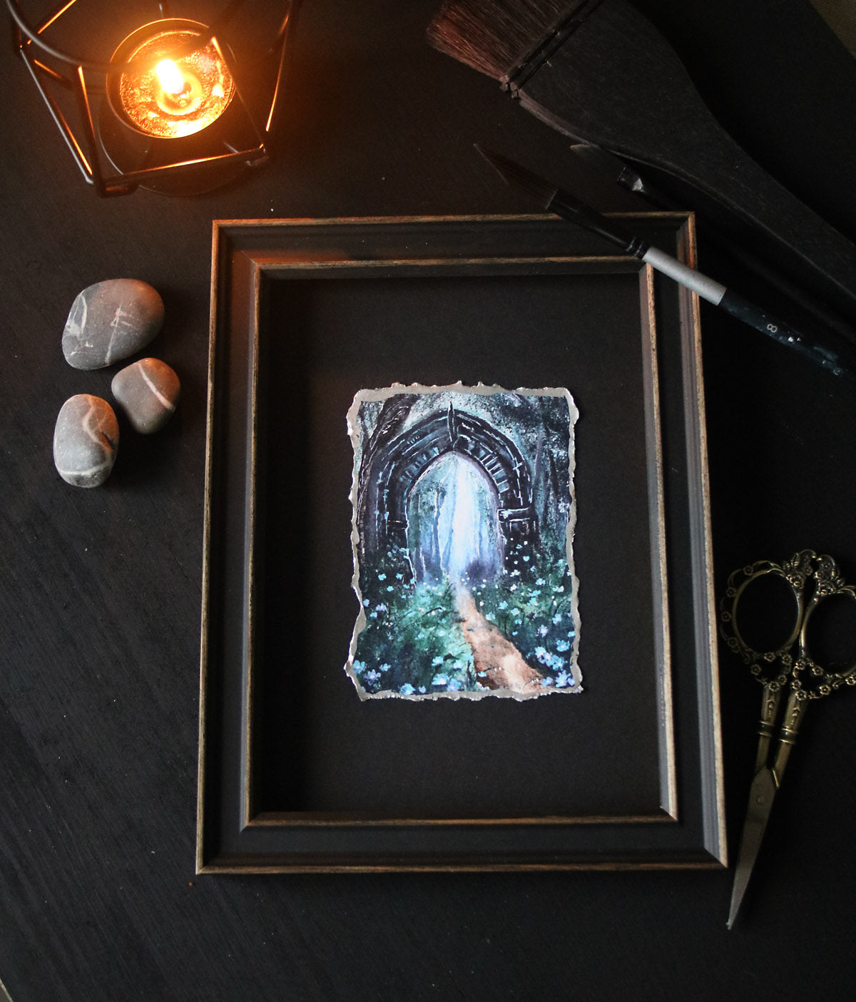 Gothic archway with a mystical landscape print