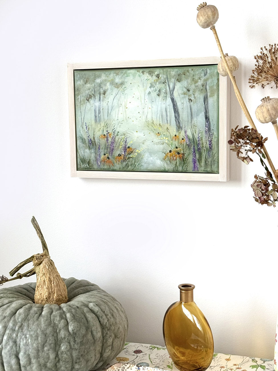 Hand-painted artwork of a misty autumn meadow with wildflowers