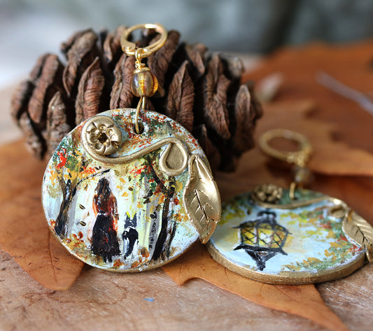 Hand painted earrings with autumn scene girl and the dog