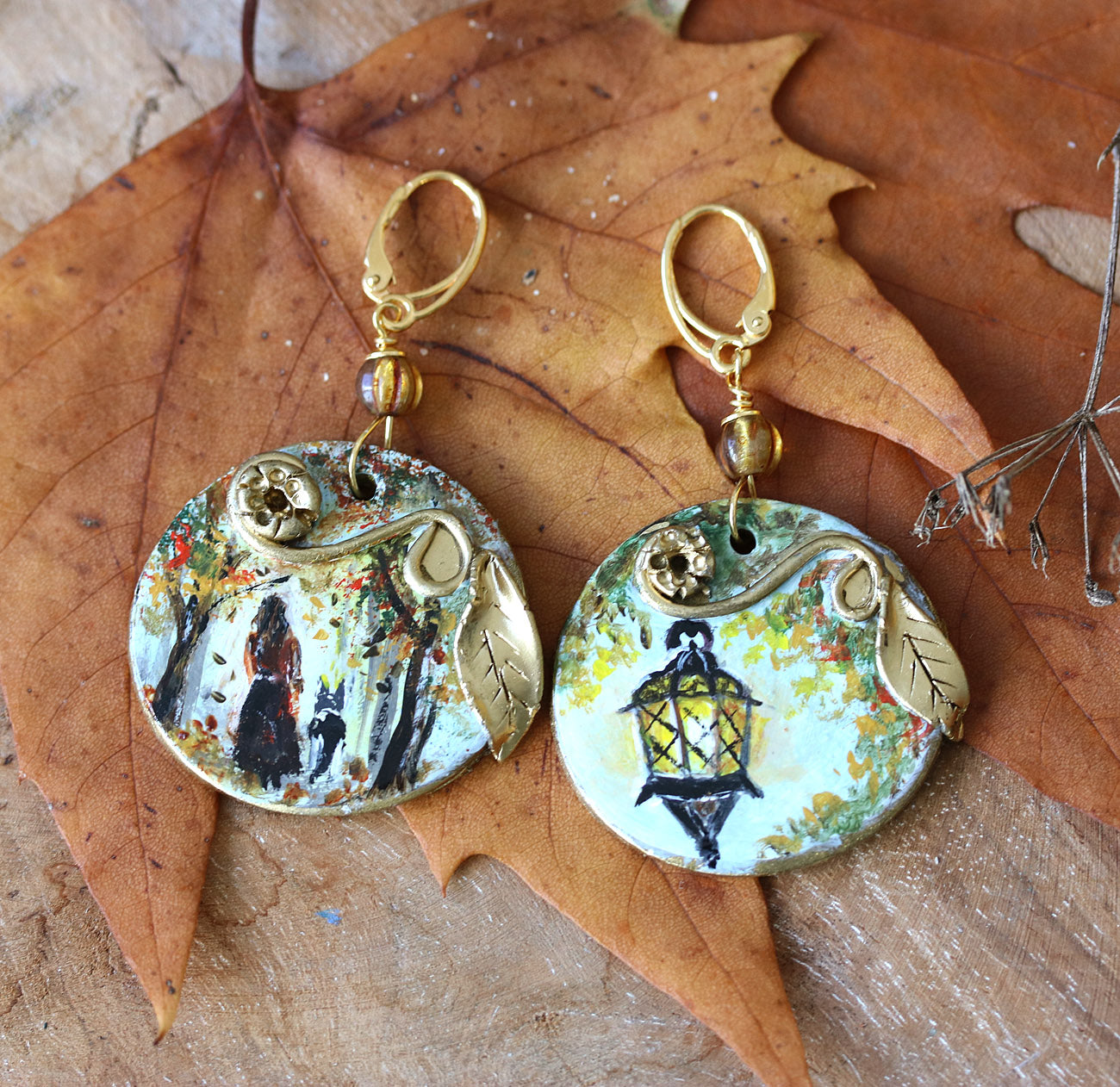 Hand painted earrings with autumn scene girl and the dog and lantern
