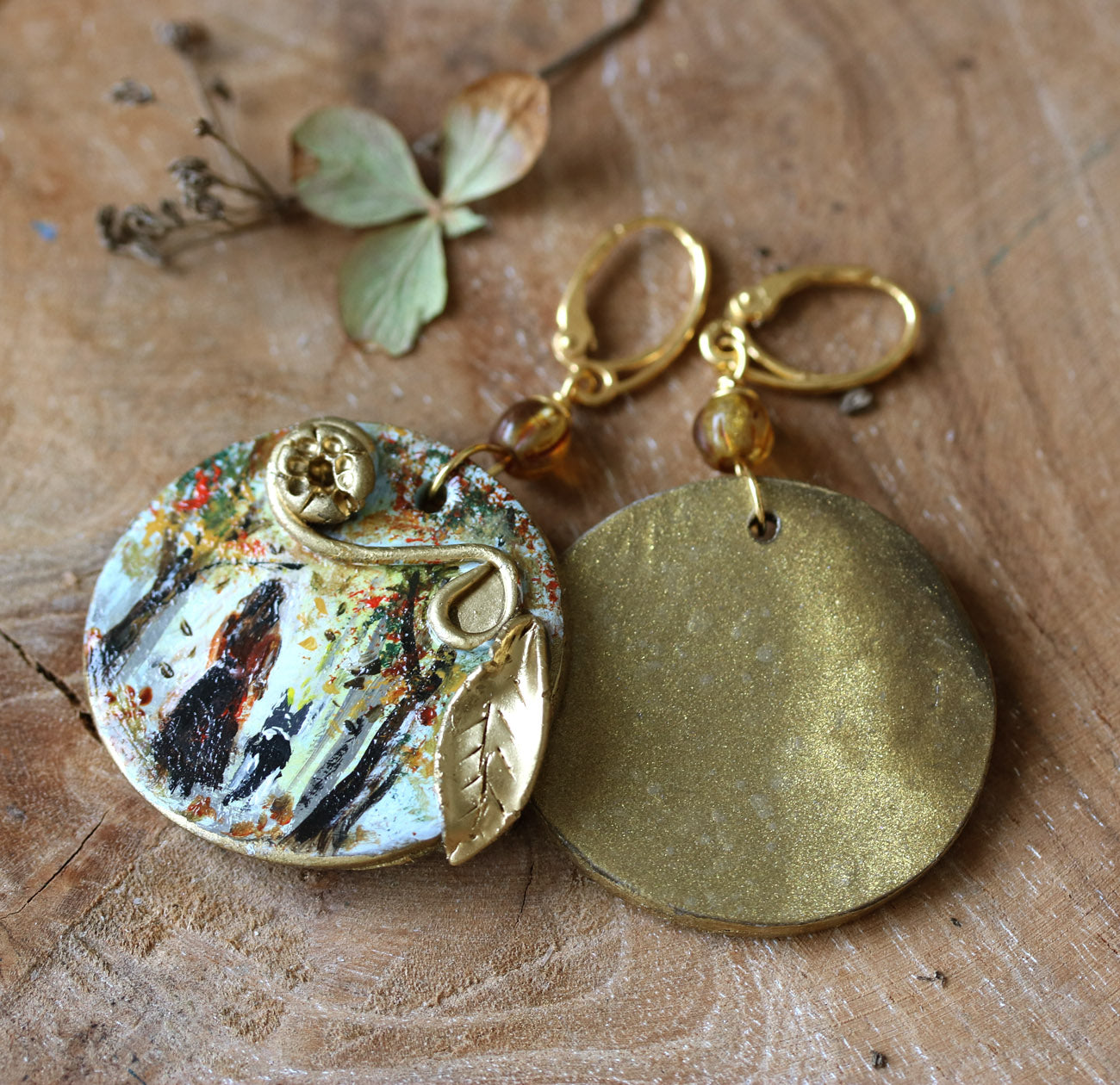 Hand painted earrings with autumn scene girl and the dog