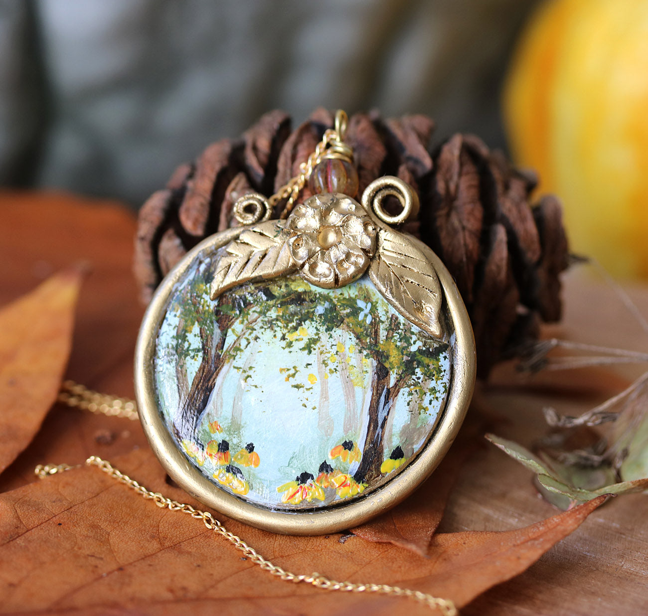 Necklace with a pendant depicting a forest scene on autumn leaves hand-painted jewelry by Katie Koroleva