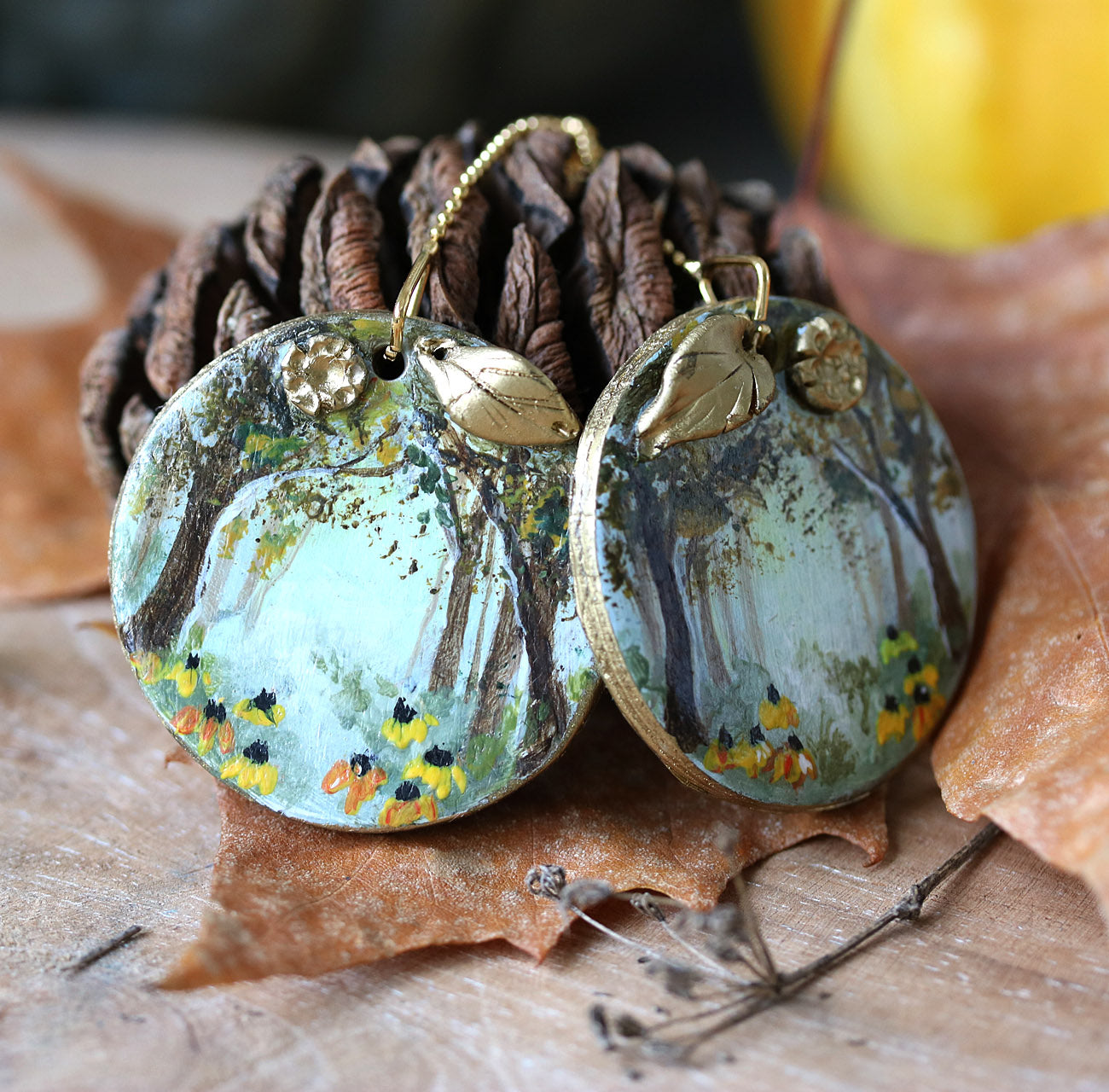 Hand-painted long earrings on golden chain
