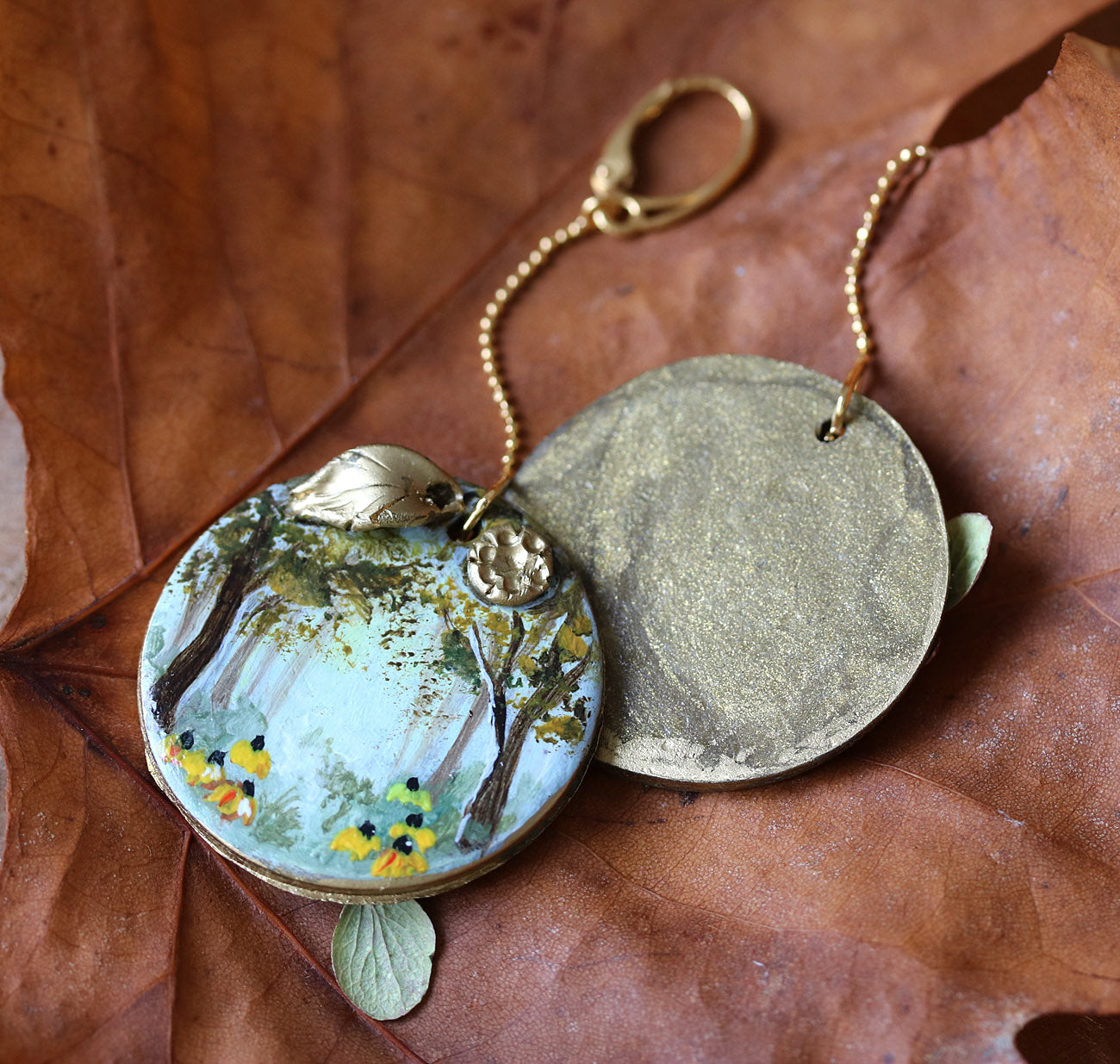 Hand-painted long earrings on golden chain