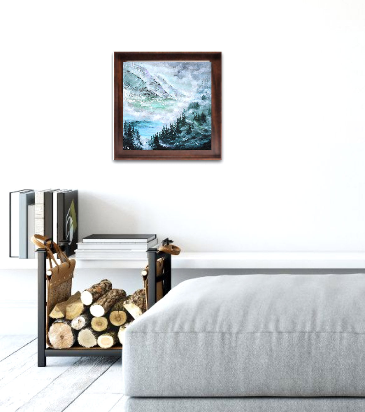 Framed landscape painting on a wall above a shelf with firewood in a modern living room.