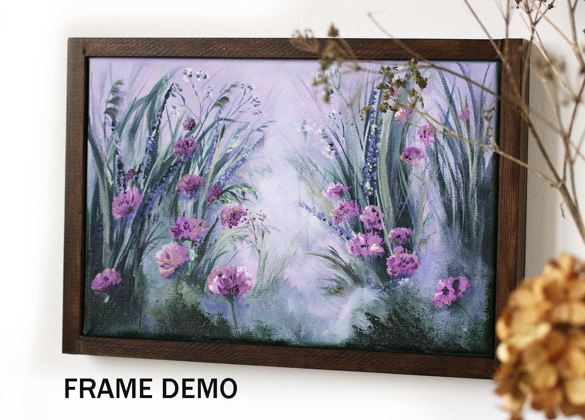 Framed painting of purple flowers and greenery on a white wall.