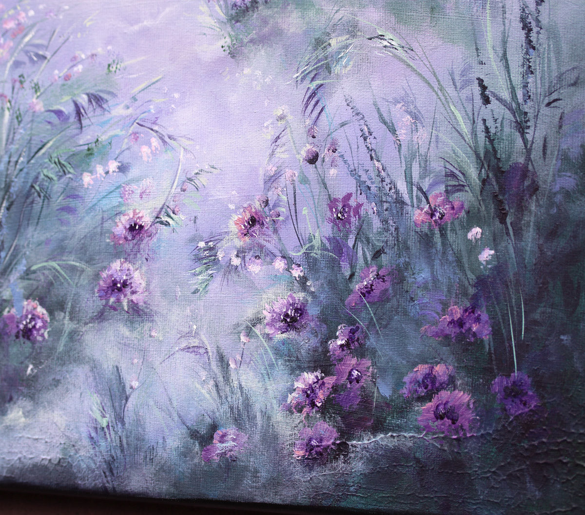 Painting of purple flowers and green grass on a textured surface