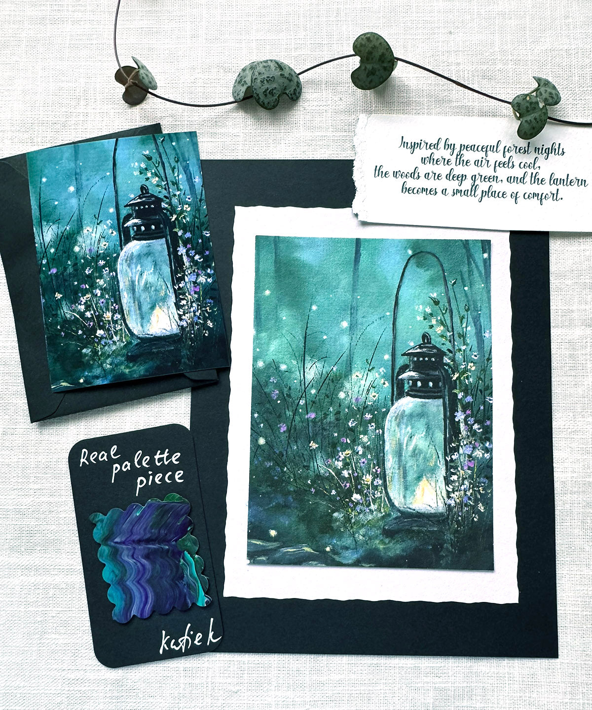 Framed artwork of a lantern in a forest with a quote on a textured white background.