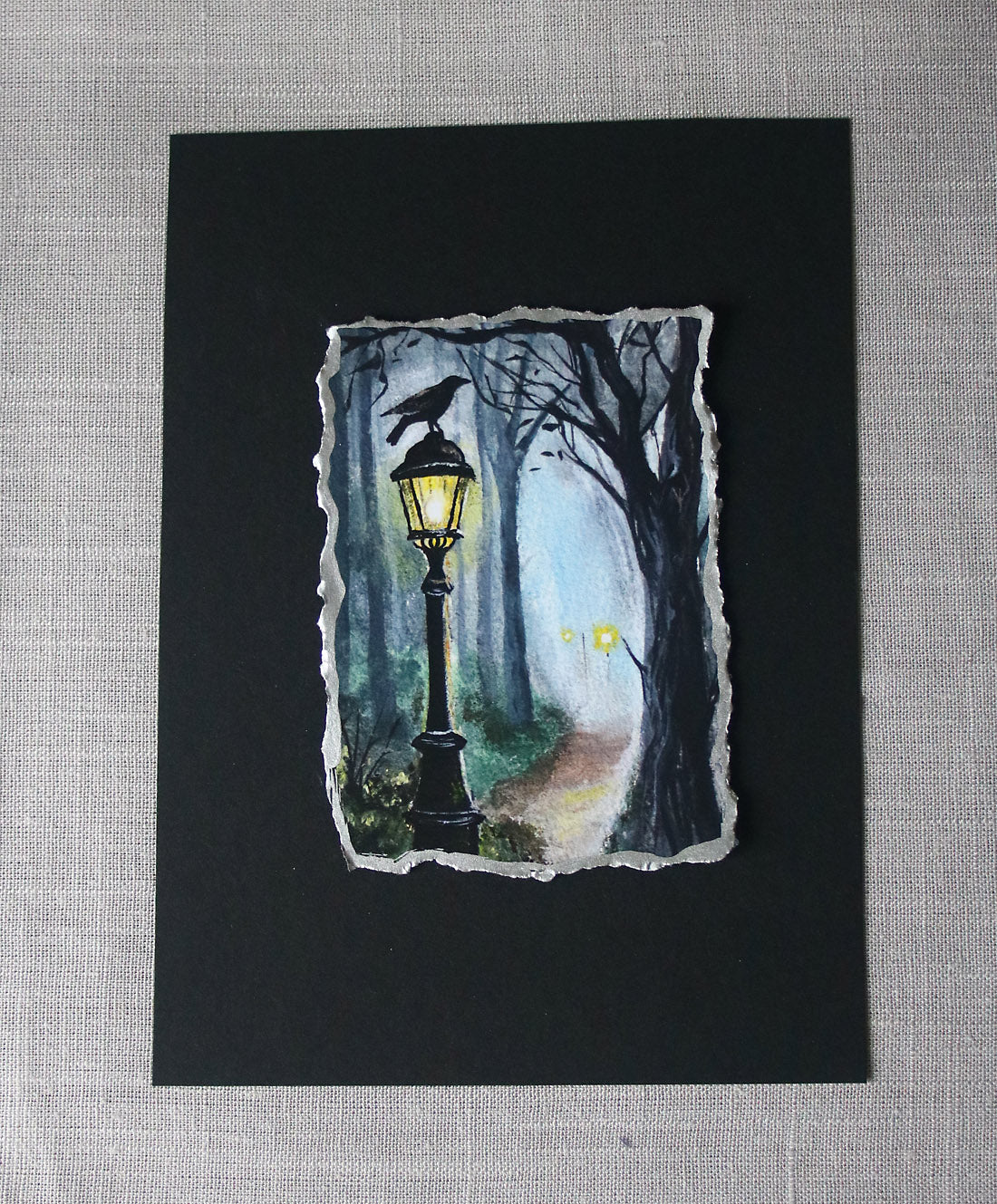 Black raven on a lantern artisan print