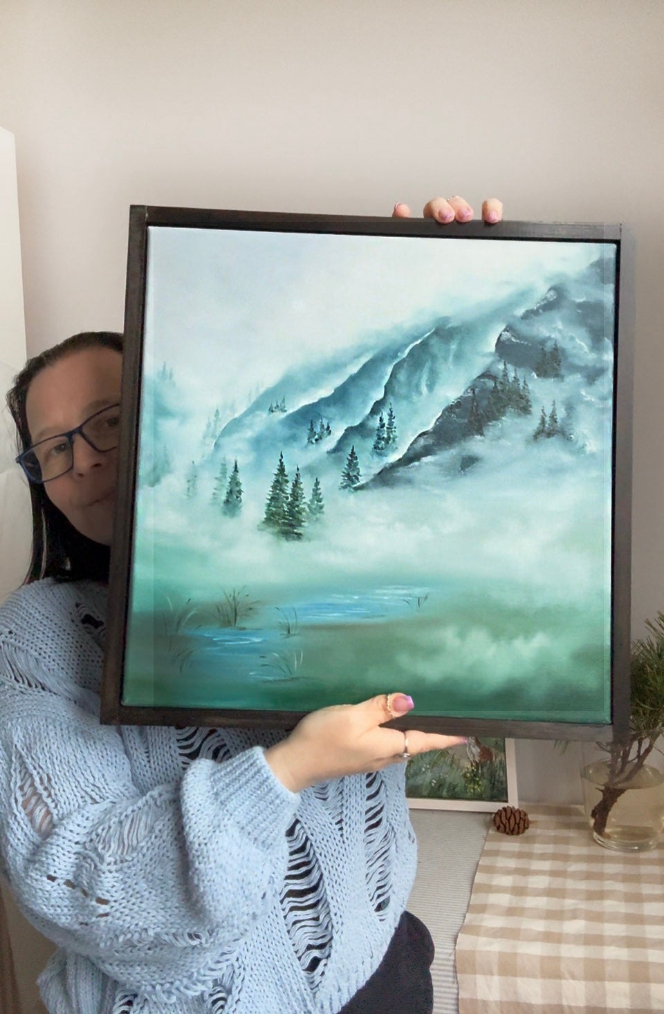 Framed oil landscape painting in cool blue green colors