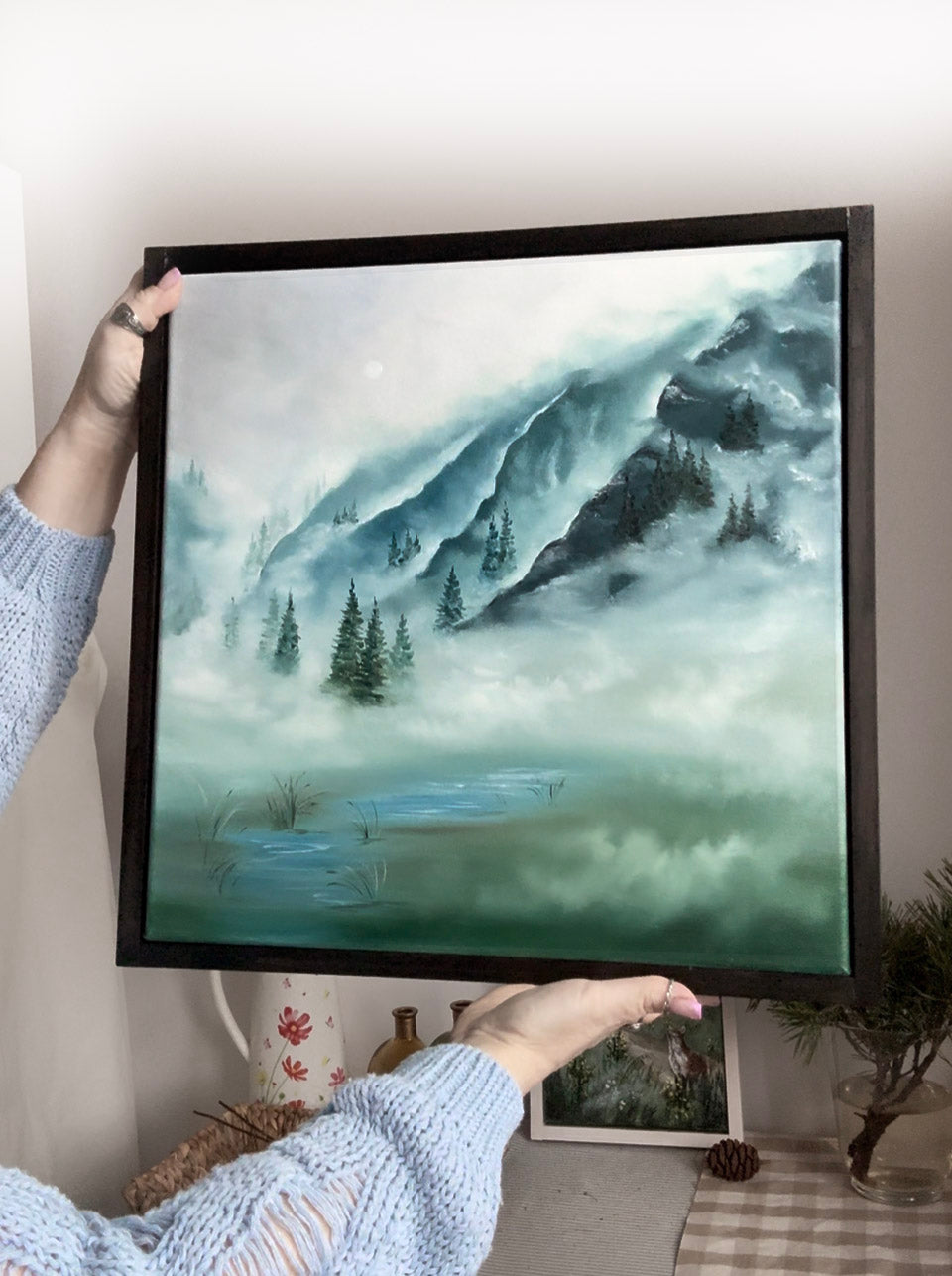 Framed oil landscape painting in cool blue green colors