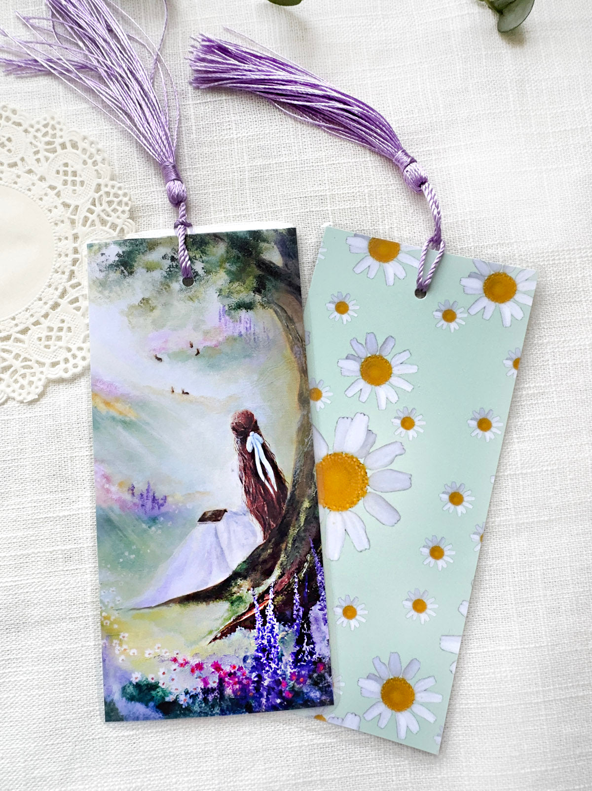 Art bookmarks reading girl among looming wildflowers