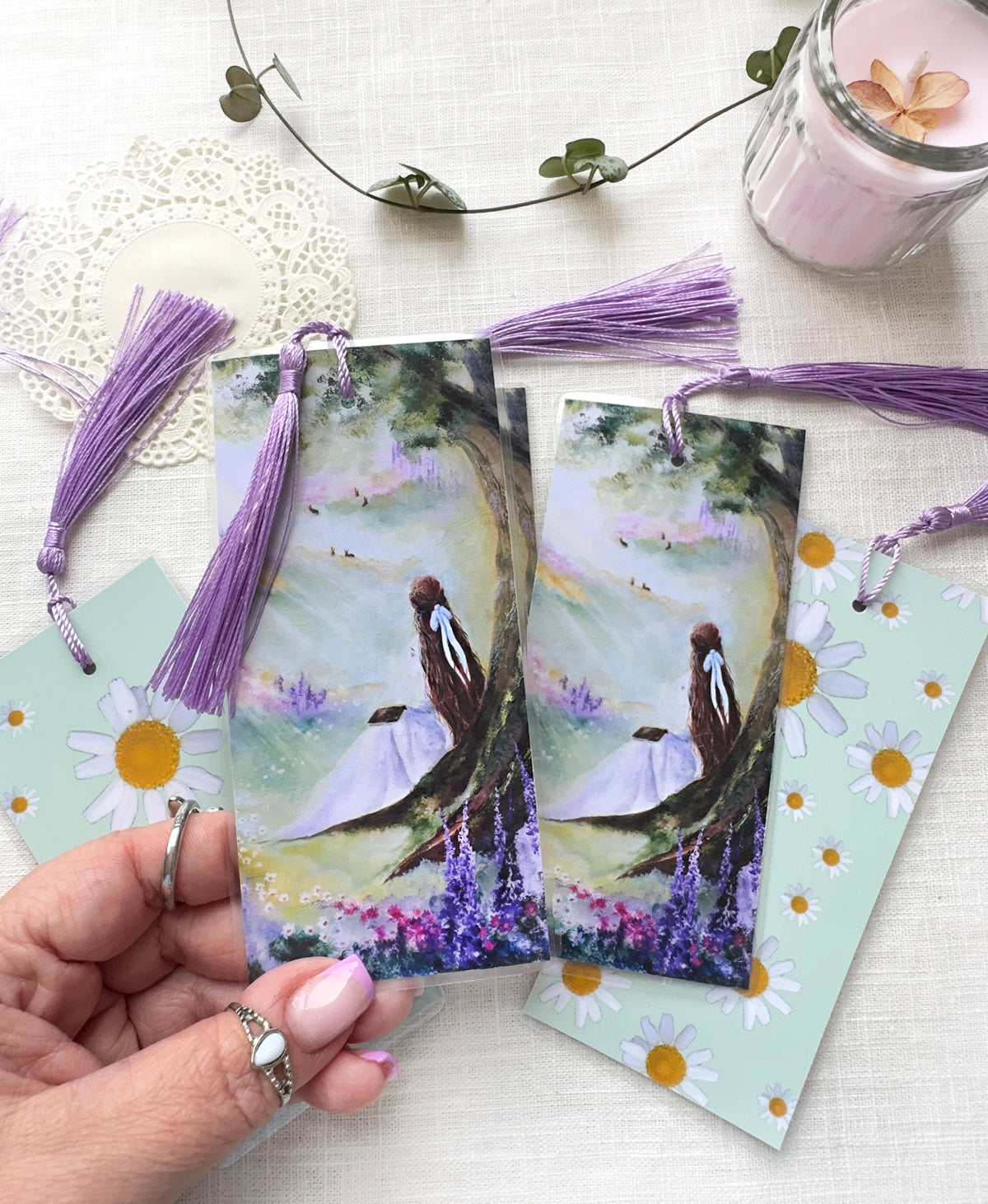 Art bookmarks reading girl among blooming wildflowers