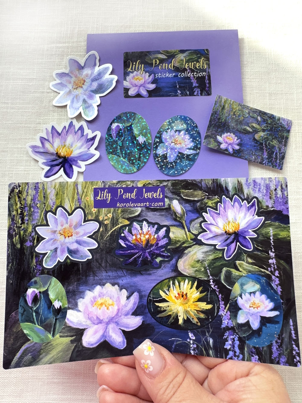 Sticker collection of water lilies with a purple packaging box.