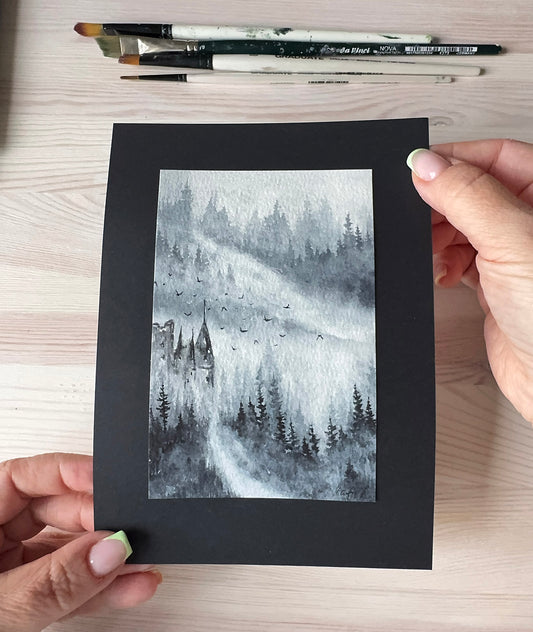 Moody grey watercolor landscape painting with castle