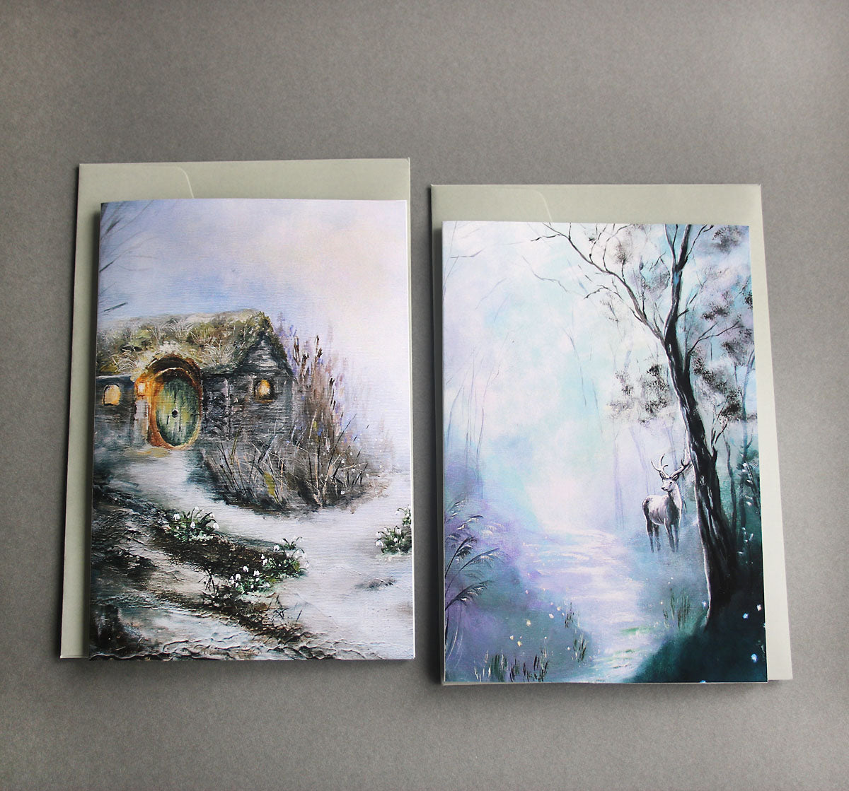 Dark forest greeting cards with hobbit cottage and deer illustrations