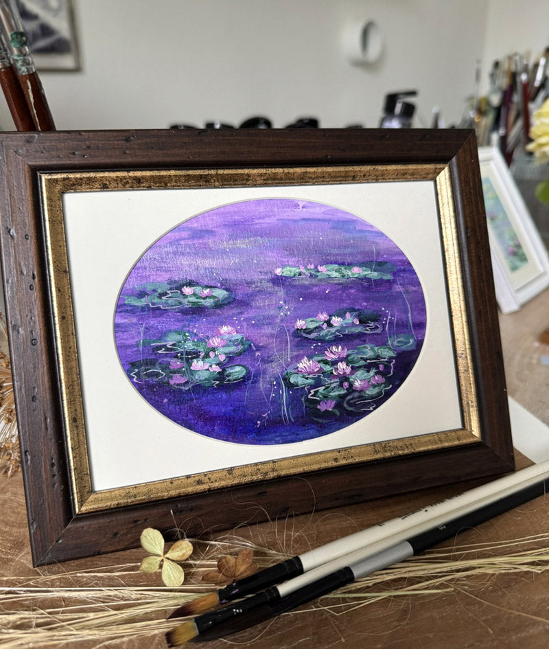 Framed artwork of water lilies Impressionist style art