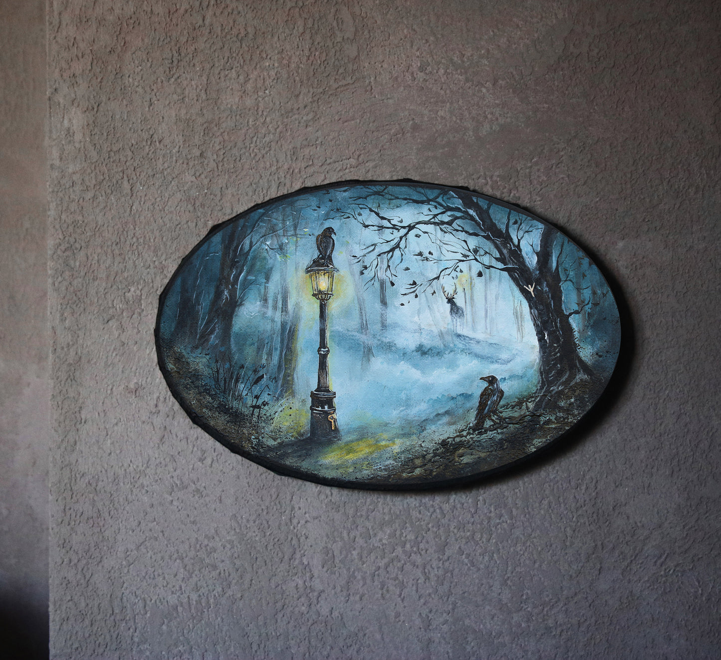 Mystical forest painting with glowing lantern, ravens, and soft teal mist. Enchanted woodland artwork featuring subtle runic symbolism and a moody, atmospheric path.
