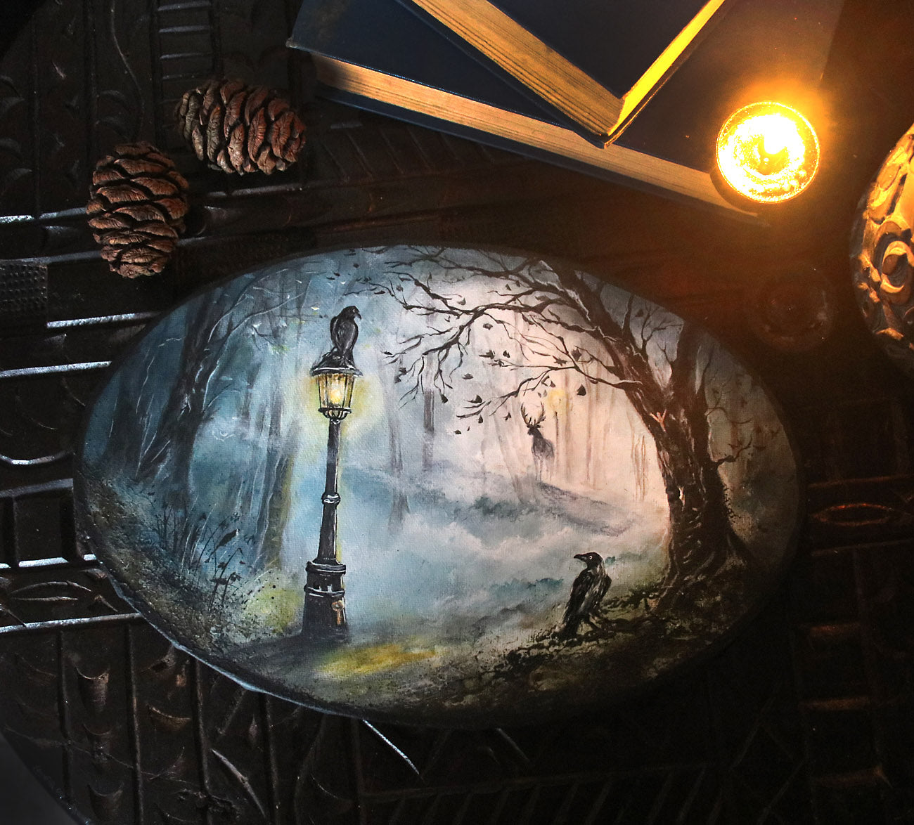 Mystical forest painting with glowing lantern, ravens, and soft teal mist. Enchanted woodland artwork featuring subtle runic symbolism and a moody, atmospheric path.