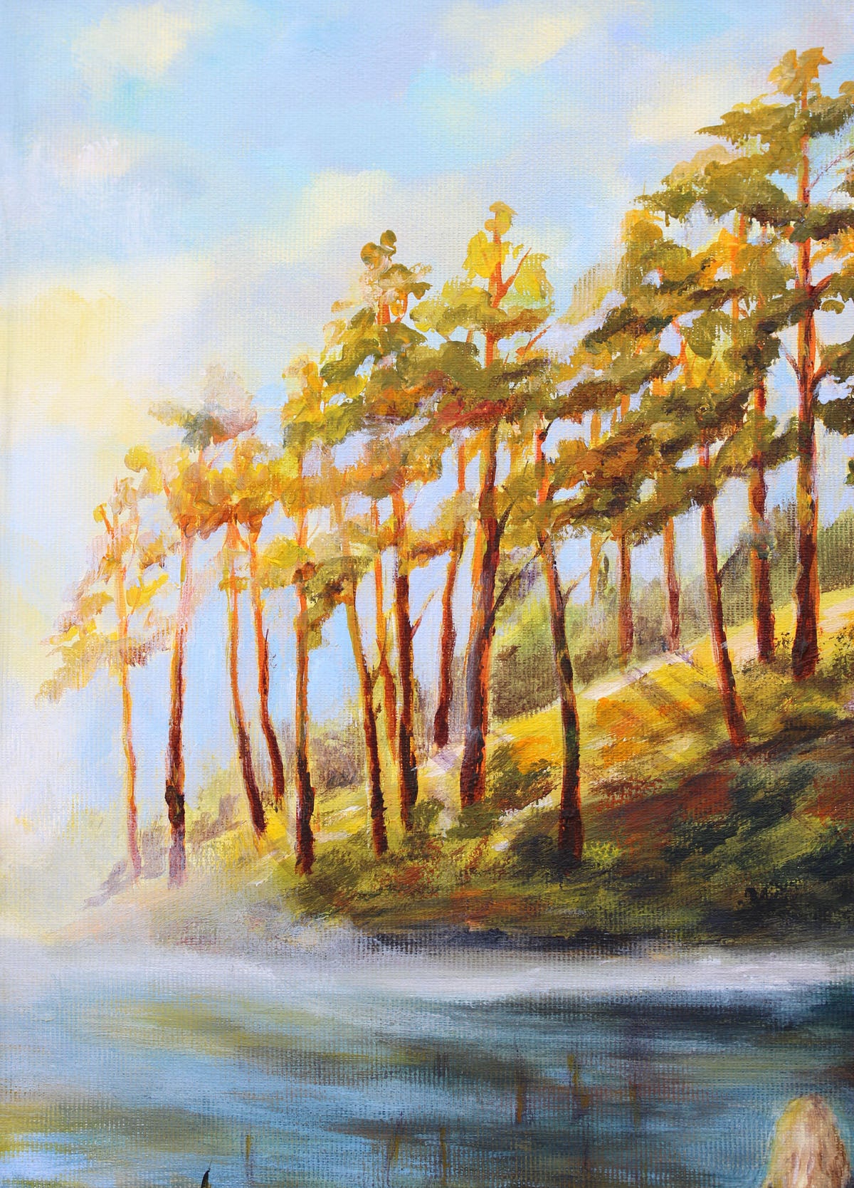 An impressionistic landscape painting of a forest with tall trees along a riverbank, rendered in warm greens, yellows, and browns against a pale blue sky, with blue water in the foreground.