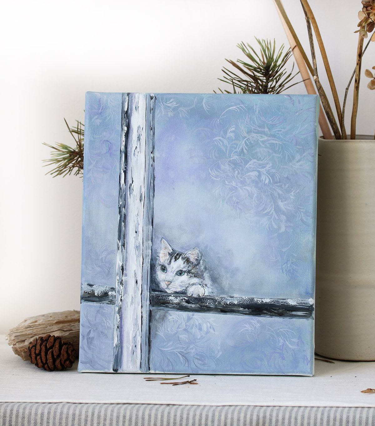 Cat peeking through a frost-covered window original painting